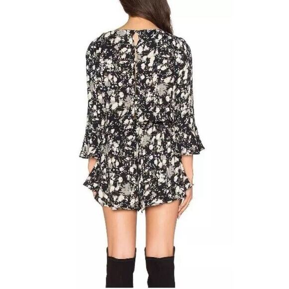 FREE PEOPLE All The Right Ruffles Romper in Black Raven Combo. Size Small - Picture 2 of 11